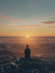 Obraz premium Lone silhouette of person at peak, overlooking breathtaking horizon.