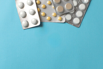 Tablets on monochrome background