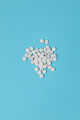 Tablets on monochrome background