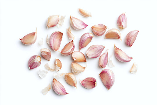 Fresh organic garlic cloves isolated on white background.