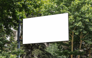 Blank white billboard on a pillar among trees. Template