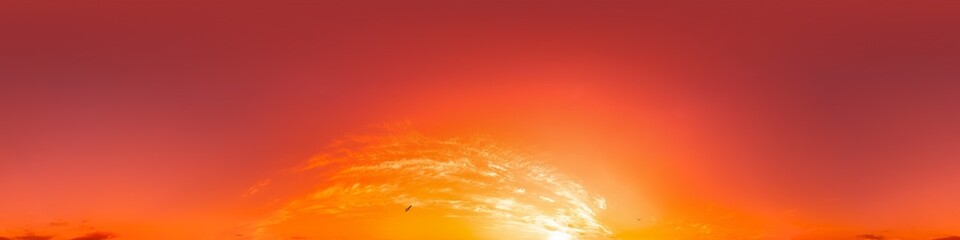 Golden glowing red orange overcast sunset sky 360 hdr panorama. Seamless spherical equirectangular panorama. Sky dome or zenith for 3D visualization and sky replacement for aerial drone 360 panoramas.