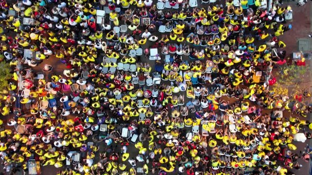 Cinematic view of the people of Colombia Celebration the classification of the World Cup in a national party in the Clock tower in Cartagena