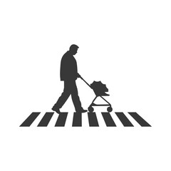 Silhouette of Man Pushing Shopping Cart Across Pedestrian Crossing