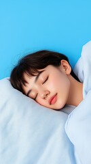 A serene young woman peacefully sleeping on soft pillows against a vibrant blue background, showcasing tranquility and relaxation.