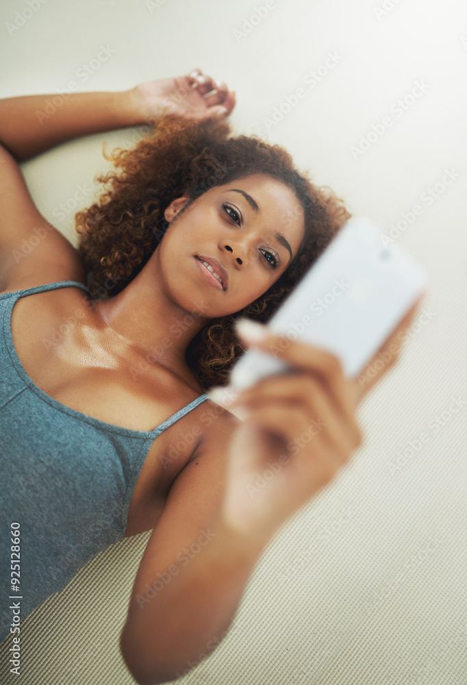 Wall mural Above, African woman and selfie for messaging app, texting and communication in home as student. Female person, photography and media update on social networking, dating site and online personality