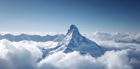 A majestic mountain peak piercing through a sea of clouds under a blue sky.