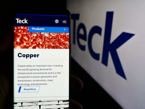 Stuttgart, Germany - 08-13-2024: Person holding cellphone with web page of Canadian mining company Teck Resources Limited in front of logo. Focus on center of phone display.
