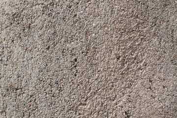 Fondo de pared de cemento con textura gris y finos. Vista de frente y de cerca. Copy space