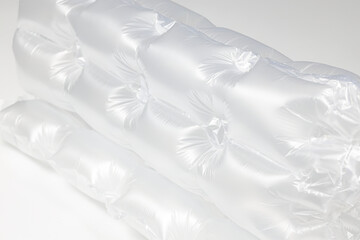 Close up plastic translucent air packaging, Plastic translucent packaging with air cushion. Inflatable air bag isolated on white background.
