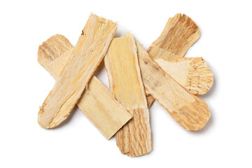 Heap of dried Astragalus root close up isolated on white background