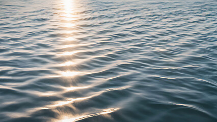 Water wave pattern in color ,the water surface in the river ripples, waves   in the sunlight during sunset