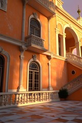 Orange Facade of a Grand House with a Balcony