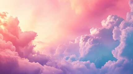 Fototapeta premium Ethereal sky with vibrant pink, purple, and blue clouds at sunset, creating a serene and dreamy atmosphere, perfect for backgrounds and designs.