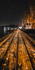 Obraz premium Wooden Dock at Night with Starry Sky