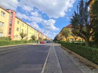 a calm side street with blue sky and clouds in Berlin Schöneweide (Treptow/Köpenick)