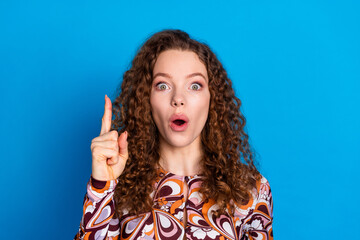 Photo portrait of pretty young girl point up think eureka wear trendy colorful outfit isolated on...