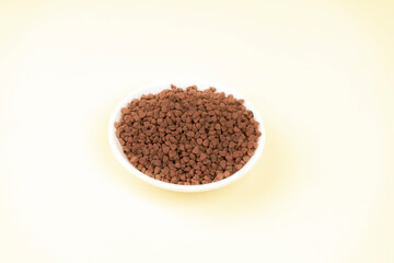 Close up of the red fruits of an achiote tree