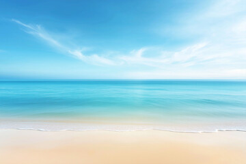 Obraz premium Calm ocean scene with gentle waves touching a sandy beach under a clear blue sky, reflecting tranquility and endless horizons, perfect for relaxing or travel concepts.