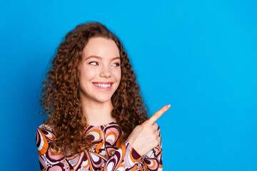 Photo portrait of pretty young girl point look empty space wear trendy colorful outfit isolated on...