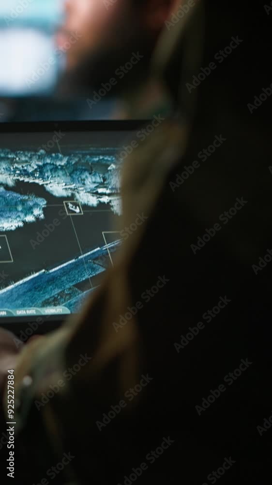 Poster vertical video army telecommunication systems operator using satellite software on tablet, providing