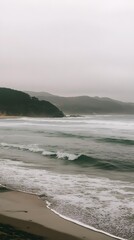 Fototapeta premium Ocean Waves Crashing On Sandy Beach