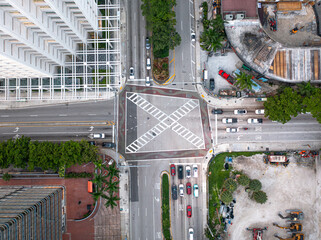 Aerial hawk eye shot of a crosswalk in downtown Miami Florida. 