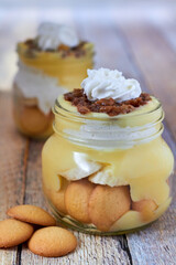 Banana Pudding with a pecan crumble and whipped cream