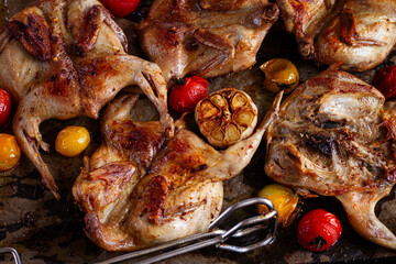 grilled quail meat, on a platter, tobacco, in the oven, with spices, homemade, without people,
