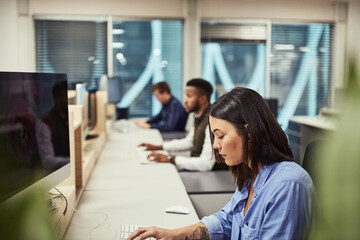 Cubicle, typing and businesswoman with computer in office with research for customer leads....