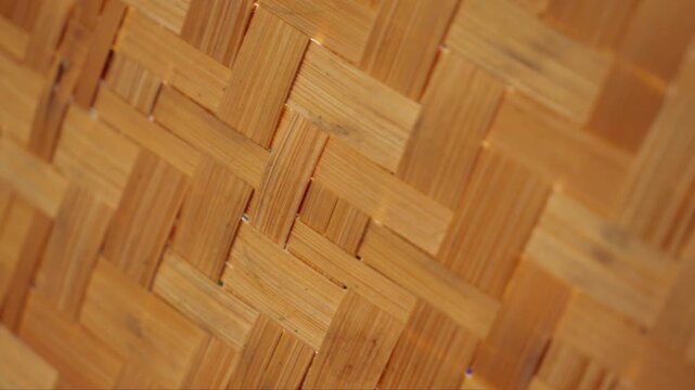 Intricate texture of intersecting bamboo stalks, showcasing their natural cross-pattern