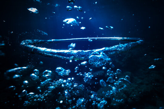 Air ring and bubbles in deep blue sea