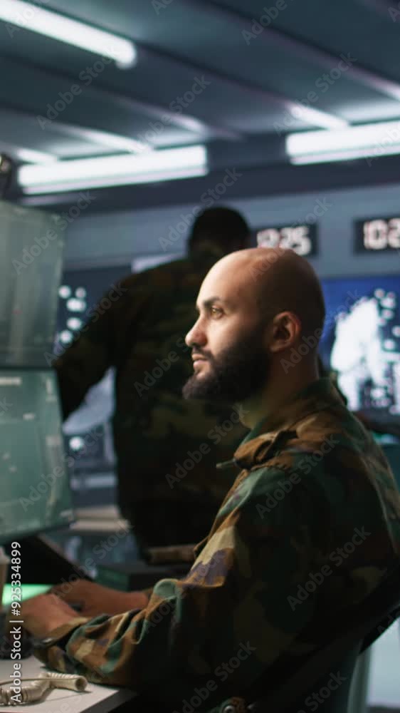 Poster vertical video special forces professional in military hq base gathering information on enemy troops