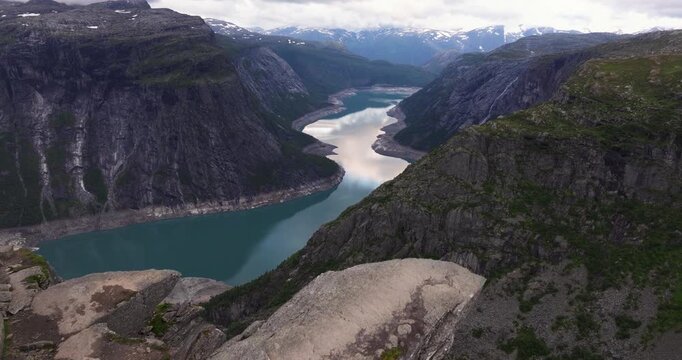 Incredible Establishing Drone Shot Above Famous Trolltunga Ledge. Hiking Norway