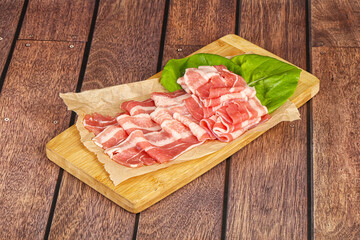 Sliced pork bacon in the bowl