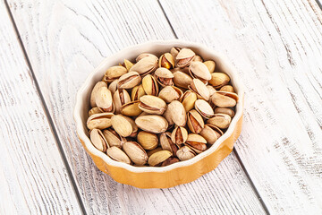 Salted tasty pistachio nuts heap