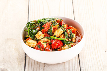 Chicken with tomato and spinach