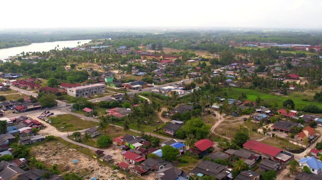 A view of the Malaysian town of Besut from above. Pan to left, 4K