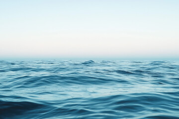 A Tranquil Ocean Horizon with Gentle Waves and a Crisp Blue Sky that Invites Serenity and Calmness to the Mind and Spirit