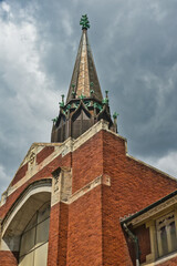 Fototapeta premium Vintage Church steeple with stormy sky's 