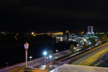 The embankment of the Tura River in the central part of the city. Night time.