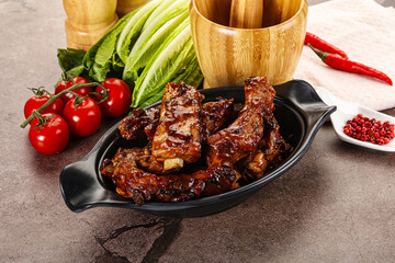 Grilled pork ribs in barbecue sauce