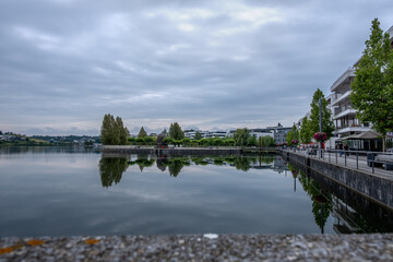  View of the lake and residential buildings in the city of Dortmund Germany. Phoenix See.