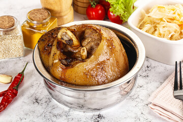 Baked pork knee with spices