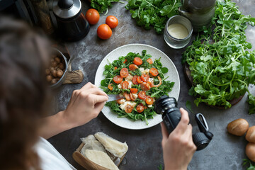 Scene of Delicious Salad Preparation Coupled with Stunning Photography Techniques. colorful salad featuring cherry tomatoes, various greens, beautifully arranged for photography. World Vegetarian Day