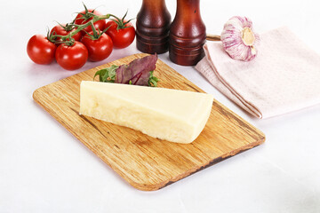 Piece Italian hard parmesan cheese