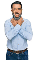 Middle aged man with beard wearing business shirt shouting suffocate because painful strangle....