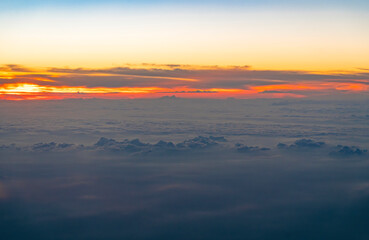 aerial view of cloud and twilight sky after sunset from airplane