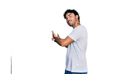 Hispanic young man with beard wearing casual white t shirt inviting to enter smiling natural with open hand
