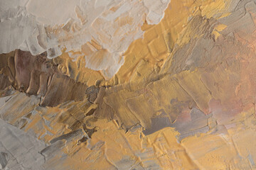 Art Acrylic, oil hand drawn smear blot canvas painting. Abstract texture gold, beige, brown color stain background.